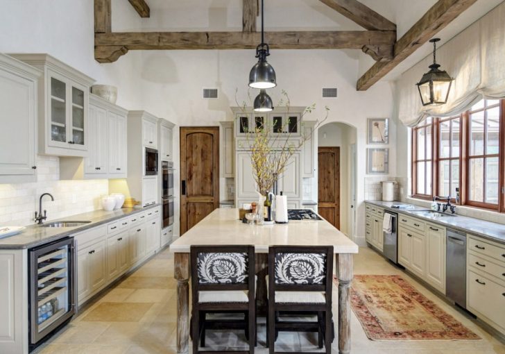 Whitewashed ceiling in the country style kitchen