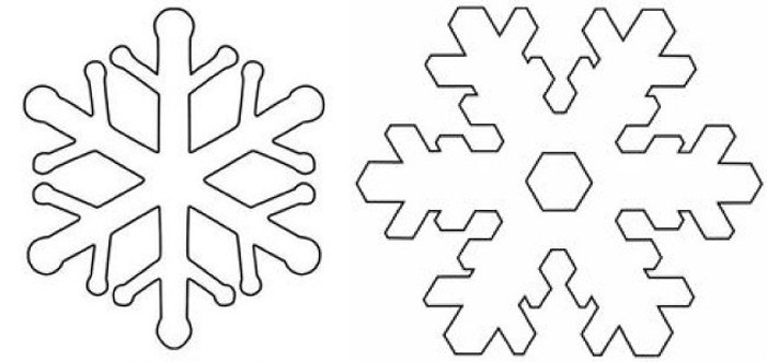 Другой способ сделать красивые снежинки — просто вырезать их из жёсткого фетра и украсить полубусинами или пуговицами