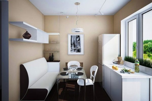 На этом фото диван-кушетка в интерьере маленькой кухни в современном стиле